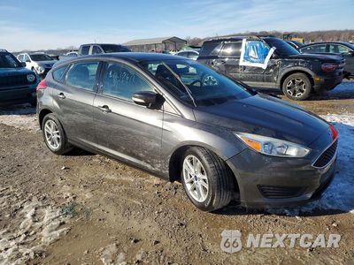 Czwarte zdjęcie samochodu z boku: 2017 FORD FOCUS SE VIN:1FADP3K23HL295690 - miniatura