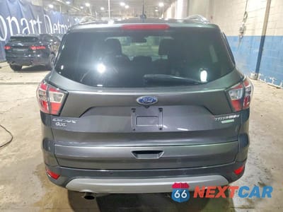 Zdjęcie 6 z 13 samochodu: 2017 FORD ESCAPE TITANIUM VIN:1FMCU0J97HUA21586 - miniatura
