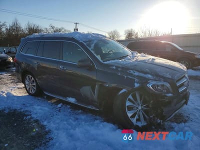 Czwarte zdjęcie samochodu z boku: 2016 MERCEDES-BENZ GL 450 4MATIC VIN:4JGDF6EE7GA651262 - miniatura