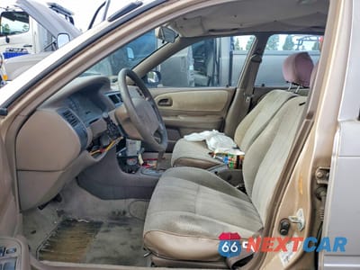 Zdjęcie 7 z 12 samochodu: 1997 TOYOTA COROLLA BASE VIN:1NXBA02E1VZ649994 - miniatura