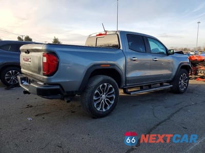 Trzecie zdjęcie samochodu z tyłu: 2025 GMC CANYON DENALI VIN:1GTP2FEK0S1243603 - miniatura