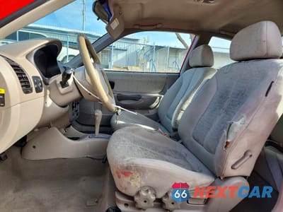 Zdjęcie 7 z 12 samochodu: 2003 HYUNDAI ACCENT GL VIN:KMHCG35C43U256244 - miniatura