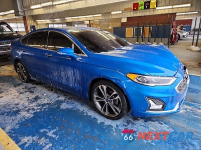 Czwarte zdjęcie samochodu z boku: 2020 FORD FUSION TITANIUM VIN:3FA6P0D92LR137434 - miniatura