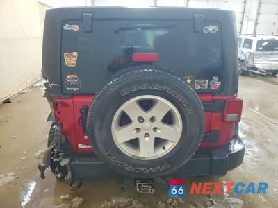 Zdjęcie 6 z 12 samochodu: 2012 JEEP WRANGLER UNLIMITED SPORT VIN:1C4BJWDG0CL135448 - miniatura
