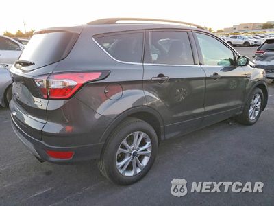 Trzecie zdjęcie samochodu z tyłu: 2018 FORD ESCAPE SE VIN:1FMCU0GD0JUD22069 - miniatura