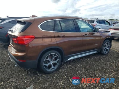 Trzecie zdjęcie samochodu z tyłu: 2017 BMW X1 XDRIVE28I VIN:WBXHT3C33H5F82651 - miniatura
