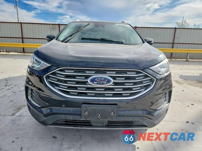 Piąte zdjęcie samochodu w środku: 2021 FORD EDGE TITANIUM VIN:2FMPK3K90MBA18424 - miniatura
