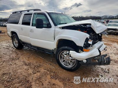 Czwarte zdjęcie samochodu z boku: 2001 CHEVROLET SUBURBAN K1500 VIN:1GNFK16T81J224048 - miniatura