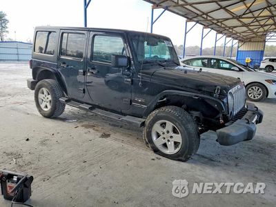 Czwarte zdjęcie samochodu z boku: 2018 JEEP WRANGLER UNLIMITED SAHARA VIN:1C4HJWEG7JL922029 - miniatura