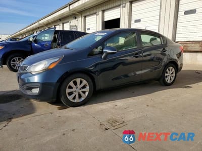 2014 KIA RIO KNADN4A36E6354125 - główne zdjęcie licytacji z USA - miniatura
