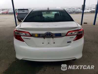 Zdjęcie 6 z 14 samochodu: 2013 TOYOTA CAMRY HYBRID VIN:4T1BD1FK4DU073426 - miniatura