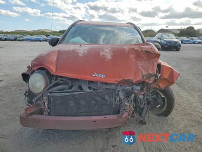 Piąte zdjęcie samochodu w środku: 2010 JEEP COMPASS SPORT VIN:1J4NT4FB1AD612046 - miniatura