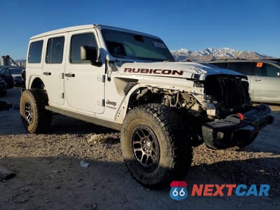 Czwarte zdjęcie samochodu z boku: 2022 JEEP WRANGLER UNLIMITED RUBICON VIN:1C4JJXFG0NW188893 - miniatura