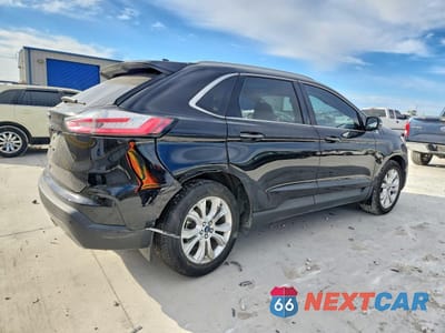 Trzecie zdjęcie samochodu z tyłu: 2021 FORD EDGE TITANIUM VIN:2FMPK3K90MBA18424 - miniatura