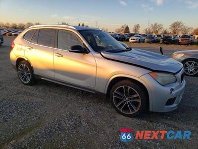 Czwarte zdjęcie samochodu z boku: 2013 BMW X1 XDRIVE28I VIN:WBAVL1C59DVR90775 - miniatura