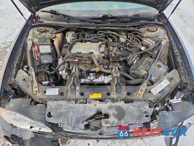 Zdjęcie 11 z 11 samochodu: 2001 CHEVROLET MONTE CARLO LS VIN:2G1WW15E319318634 - miniatura