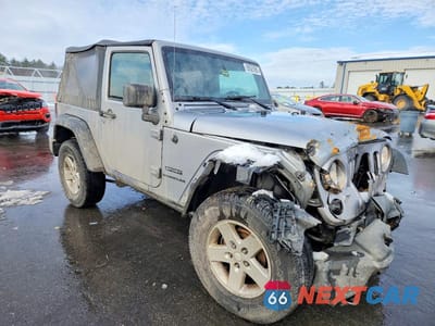 Czwarte zdjęcie samochodu z boku: 2017 JEEP WRANGLER SPORT VIN:1C4AJWAG5HL754568 - miniatura