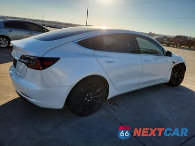 Trzecie zdjęcie samochodu z tyłu: 2019 TESLA MODEL 3 VIN:5YJ3E1EA3KF486779 - miniatura