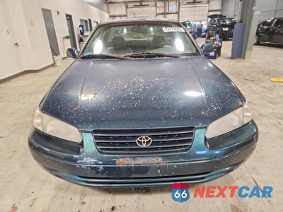 Piąte zdjęcie samochodu w środku: 1997 TOYOTA CAMRY CE VIN:4T1BG22K5VU175466 - miniatura