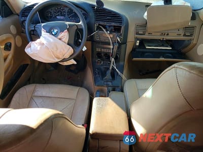 Zdjęcie 8 z 13 samochodu: 1997 BMW 328 IS AUTOMATIC VIN:WBABG2325VET34447 - miniatura