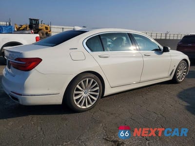 Trzecie zdjęcie samochodu z tyłu: 2018 BMW 740 XE VIN:WBA7J2C57JG938324 - miniatura