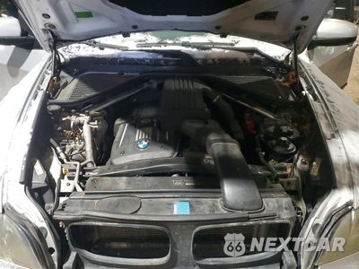 Zdjęcie 12 z 14 samochodu: 2007 BMW X5 3.0I VIN:5UXFE43587L010583 - miniatura