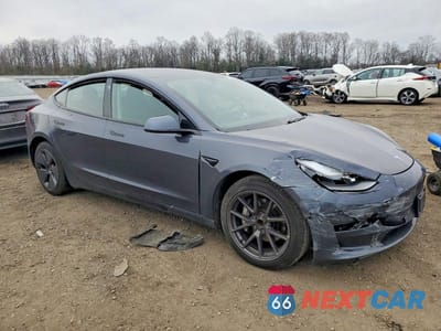 Czwarte zdjęcie samochodu z boku: 2021 TESLA MODEL 3 VIN:5YJ3E1EA6MF064301 - miniatura
