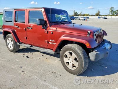 Czwarte zdjęcie samochodu z boku: 2010 JEEP WRANGLER UNLIMITED SAHARA VIN:1J4HA5H11AL196650 - miniatura