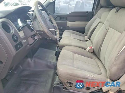 Zdjęcie 7 z 12 samochodu: 2010 FORD F150 VIN:1FTMF1CW4AKB99212 - miniatura