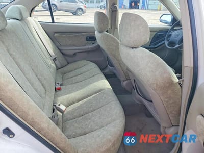 Zdjęcie 10 z 11 samochodu: 2001 HYUNDAI ELANTRA GLS VIN:KMHDN45D21U185325 - miniatura