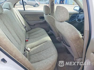 Zdjęcie 10 z 12 samochodu: 2001 HYUNDAI ELANTRA GLS VIN:KMHDN45D21U185325 - miniatura