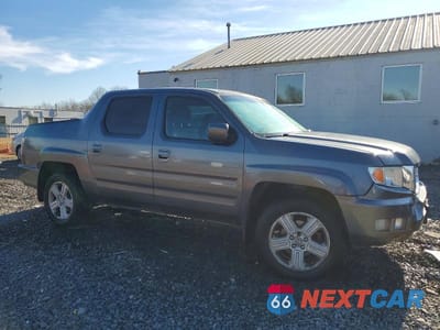 Czwarte zdjęcie samochodu z boku: 2011 HONDA RIDGELINE RTL VIN:5FPYK1F58BB001706 - miniatura