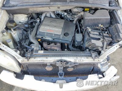 Zdjęcie 12 z 15 samochodu: 2001 TOYOTA SIENNA CE VIN:4T3ZF19C71U402734 - miniatura