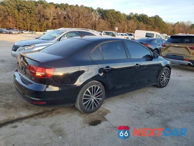 Trzecie zdjęcie samochodu z tyłu: 2016 VOLKSWAGEN JETTA SPORT VIN:3VWD17AJ4GM288852 - miniatura