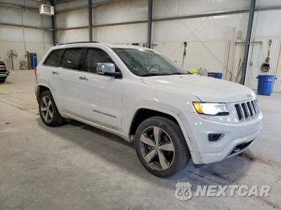 Czwarte zdjęcie samochodu z boku: 2015 JEEP GRAND CHEROKEE OVERLAND VIN:1C4RJECG9FC713965 - miniatura