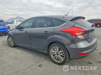 Drugie zdjęcie samochodu z przodu: 2016 FORD FOCUS TITANIUM VIN:1FADP3N2XGL374784 - miniatura