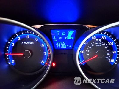 Zdjęcie 9 z 13 samochodu: 2013 HYUNDAI TUCSON GLS VIN:KM8JU3AC3DU560883 - miniatura