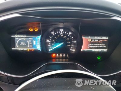 Zdjęcie 9 z 13 samochodu: 2015 FORD FUSION TITANIUM PHEV VIN:3FA6P0SU6FR237709 - miniatura