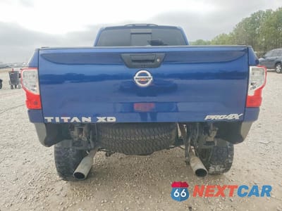Zdjęcie 6 z 13 samochodu: 2016 NISSAN TITAN XD PRO-4X VIN:1N6AA1F41GN512118 - miniatura