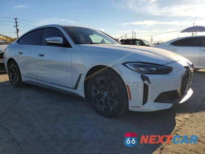 Czwarte zdjęcie samochodu z boku: 2023 BMW I4 EDRIVE 35 VIN:WBY43AW07PFP82244 - miniatura