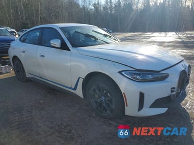 Czwarte zdjęcie samochodu z boku: 2023 BMW I4 EDRIVE35 GRAN COU VIN:WBY43AW01PFP94003 - miniatura