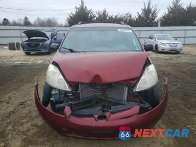 Piąte zdjęcie samochodu w środku: 2010 TOYOTA SIENNA CE VIN:5TDKK4CC3AS339267 - miniatura