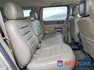Zdjęcie 11 z 13 samochodu: 2004 HUMMER H2 VIN:5GRGN23U04H102723 - miniatura