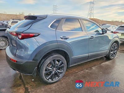 Trzecie zdjęcie samochodu z tyłu: 2023 MAZDA CX-30 PREFERRED VIN:3MVDMBCM2PM546367 - miniatura