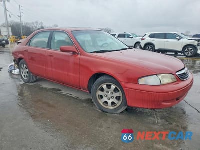 Czwarte zdjęcie samochodu z boku: 1999 MAZDA 626 ES VIN:1YVGF22C3X5818622 - miniatura