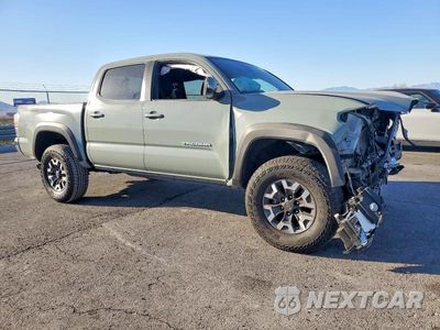 Czwarte zdjęcie samochodu z boku: 2023 TOYOTA TACOMA DOUBLE CAB VIN:3TMAZ5CN3PM206970 - miniatura