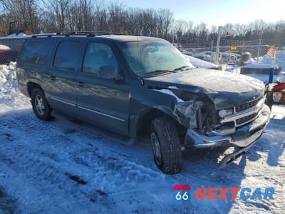 Czwarte zdjęcie samochodu z boku: 2001 CHEVROLET SUBURBAN K1500 VIN:3GNFK16T41G263124 - miniatura