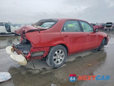 Trzecie zdjęcie samochodu z tyłu: 1999 MAZDA 626 ES VIN:1YVGF22C3X5818622 - miniatura