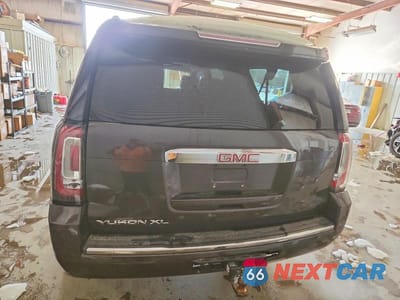 Zdjęcie 6 z 13 samochodu: 2015 GMC YUKON XL DENALI VIN:1GKS1JKJ2FR287447 - miniatura