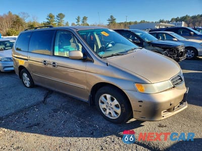 Czwarte zdjęcie samochodu z boku: 2004 HONDA ODYSSEY EX VIN:5FNRL18644B024788 - miniatura